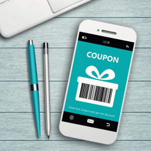A phone and laptop with coupon code. Avoid Holiday Impulse Shopping