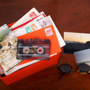 a shoebox filled with cards, tapes, and memories. 