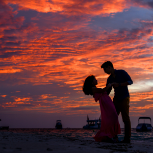 A sunet with two people dancing