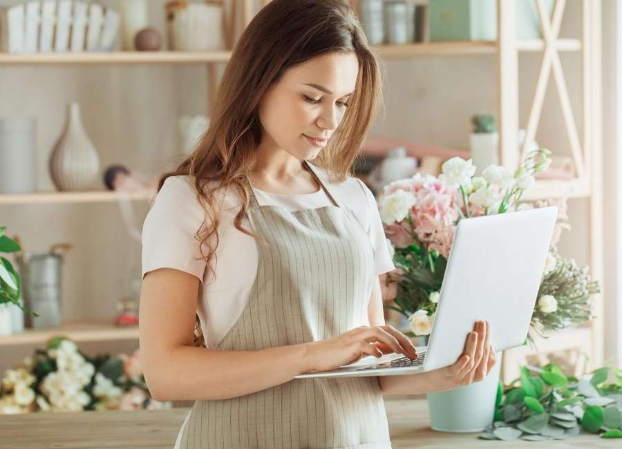 Business owner on laptop