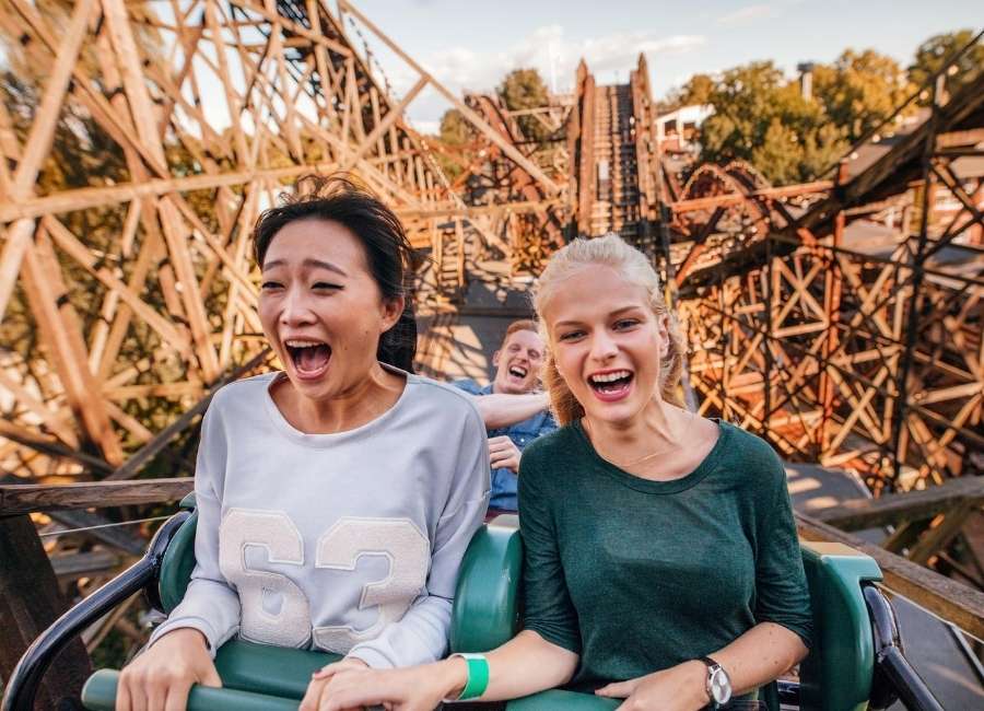 Young adults on a roller coaster