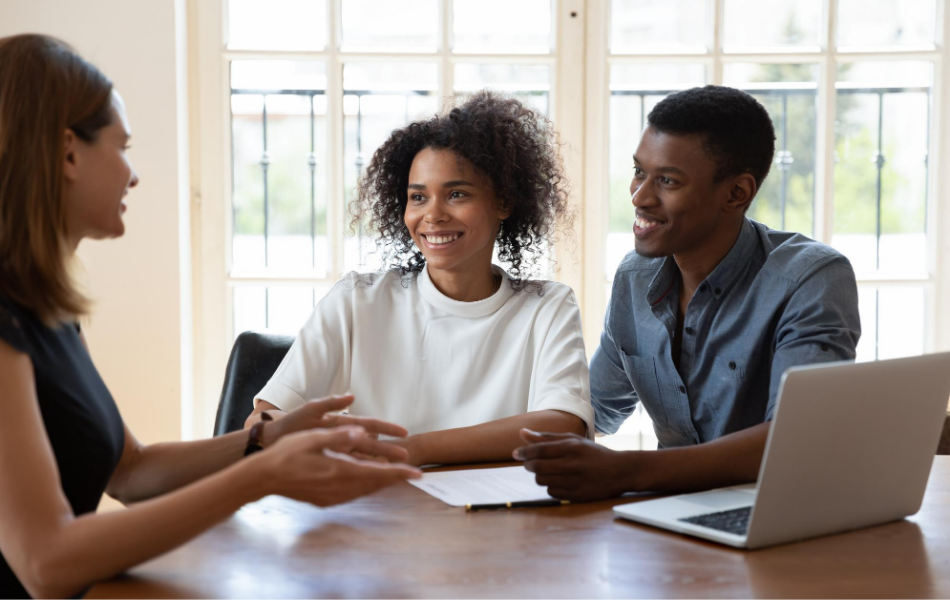 Couple with real estate agent