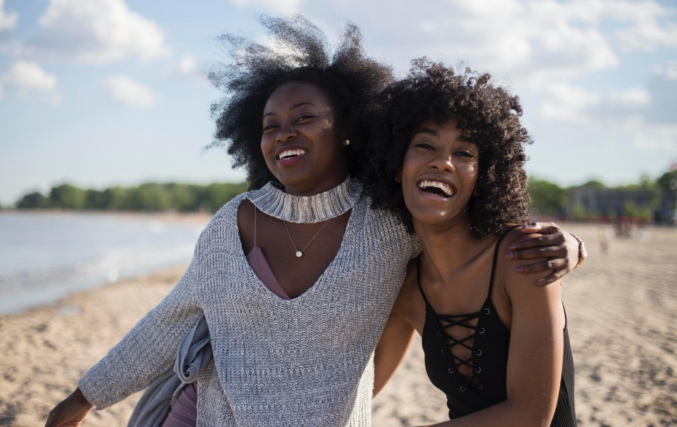 2 women smiling