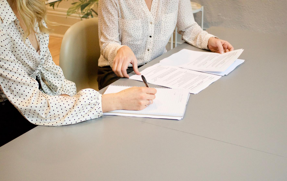 Women looking at paperwork