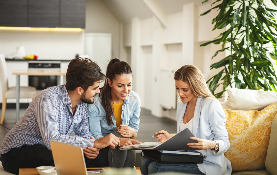 Couple with real estate agent