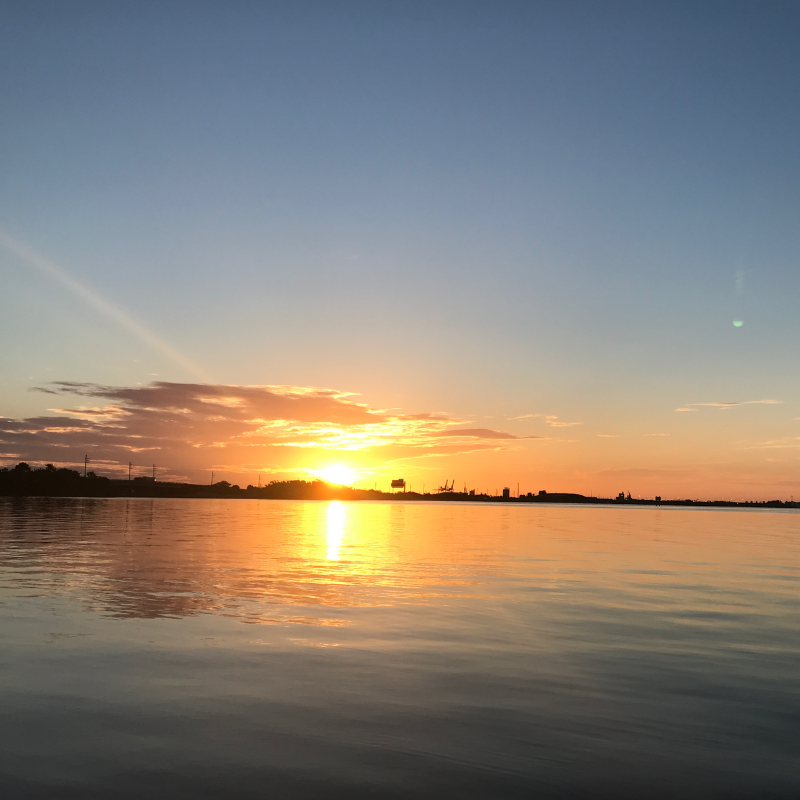 A sunrise facing the river at Kelly Park