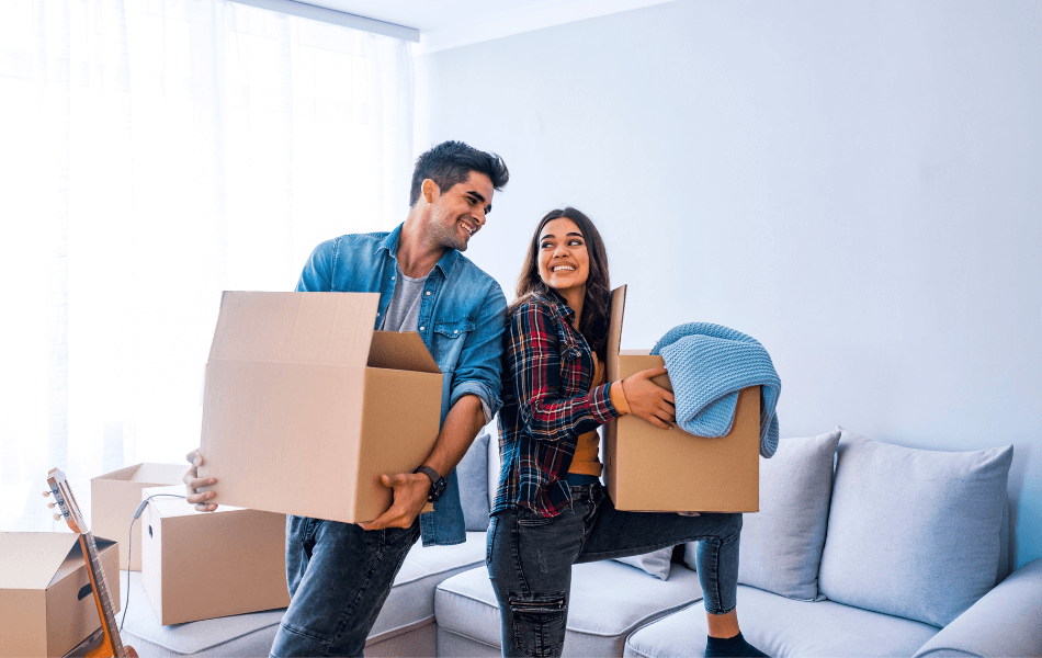 Young couple moving into their new home