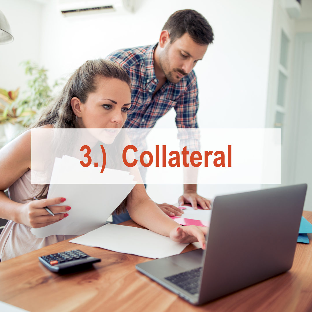 woman sitting at computer with man behind her writing | Collateral