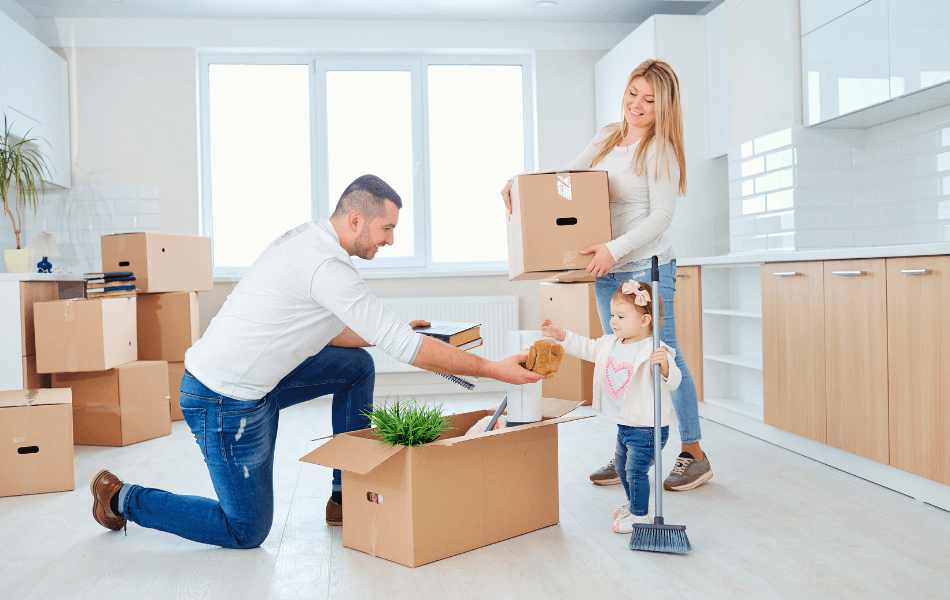 Family unpacking boxes