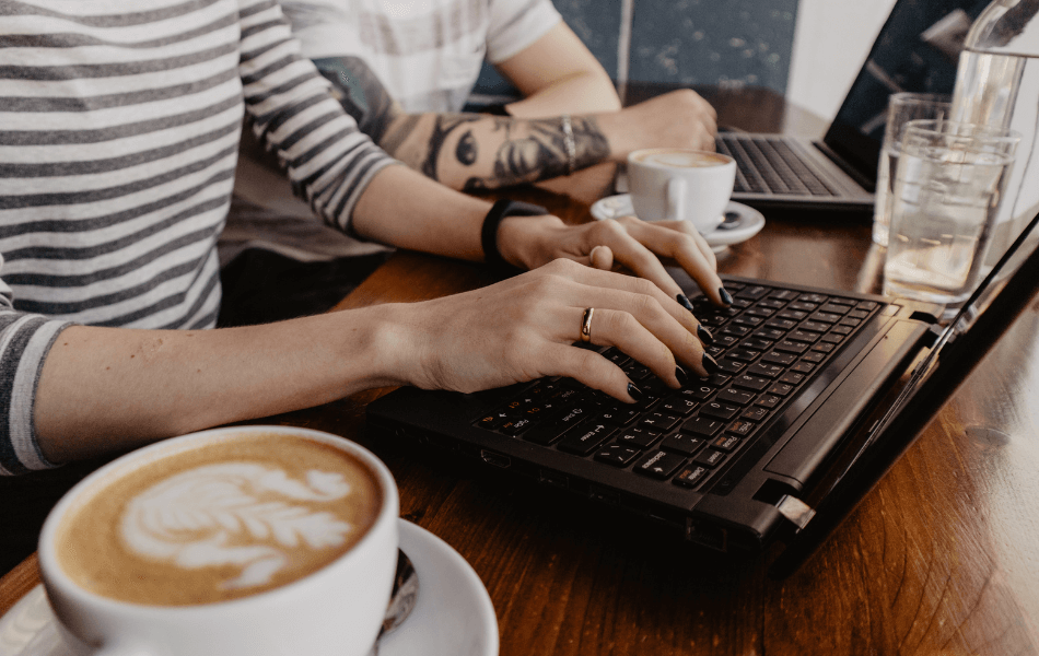 Person on a laptop in a coffee shop