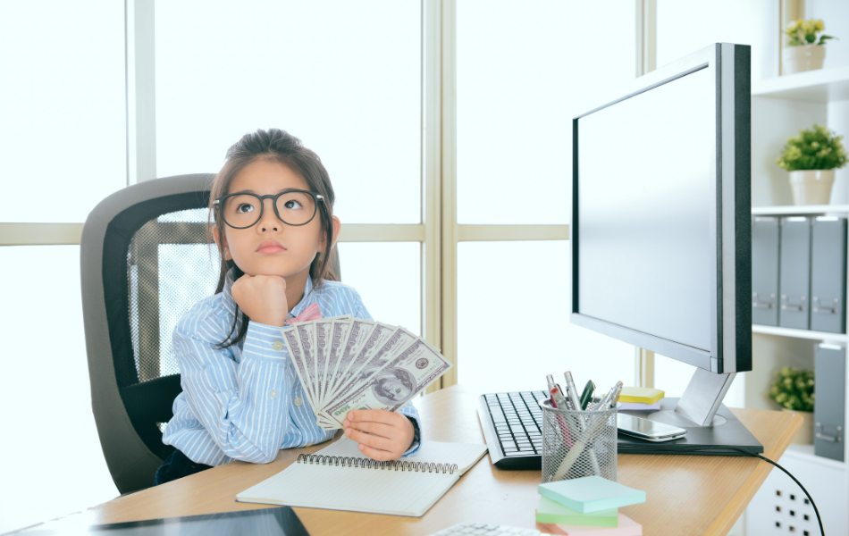 girl holding money