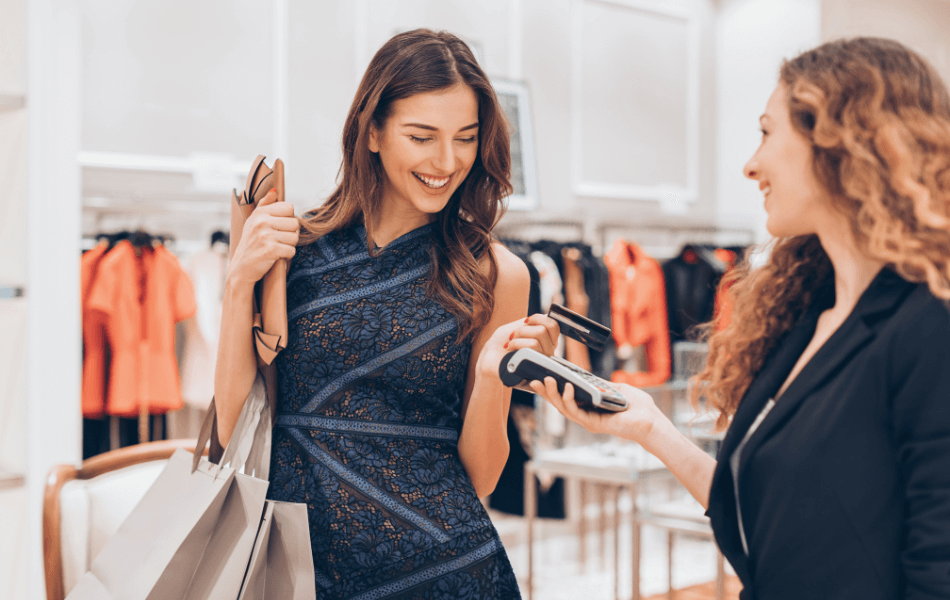 Woman using a credit card for a purchase