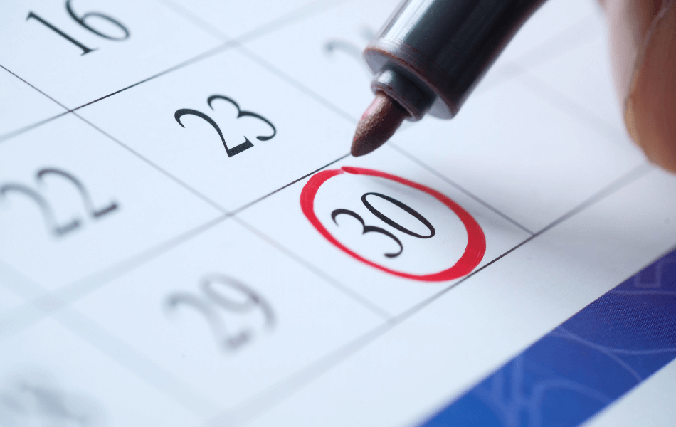 Red marker circling a date on a calendar