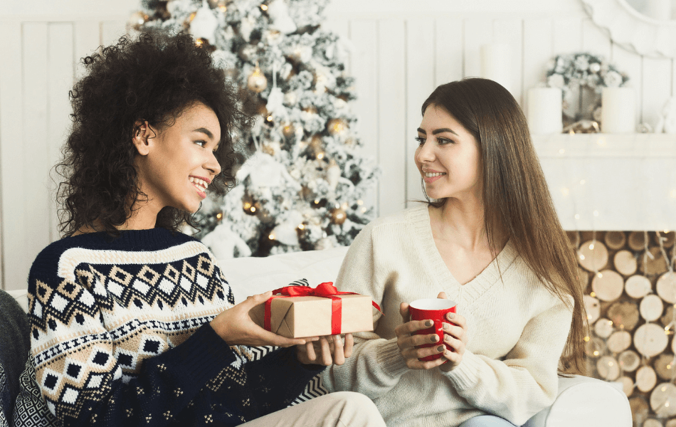 two people exchanging gifts