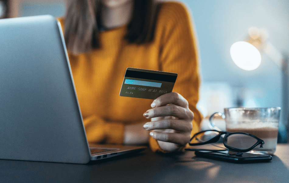 Person holding credit card