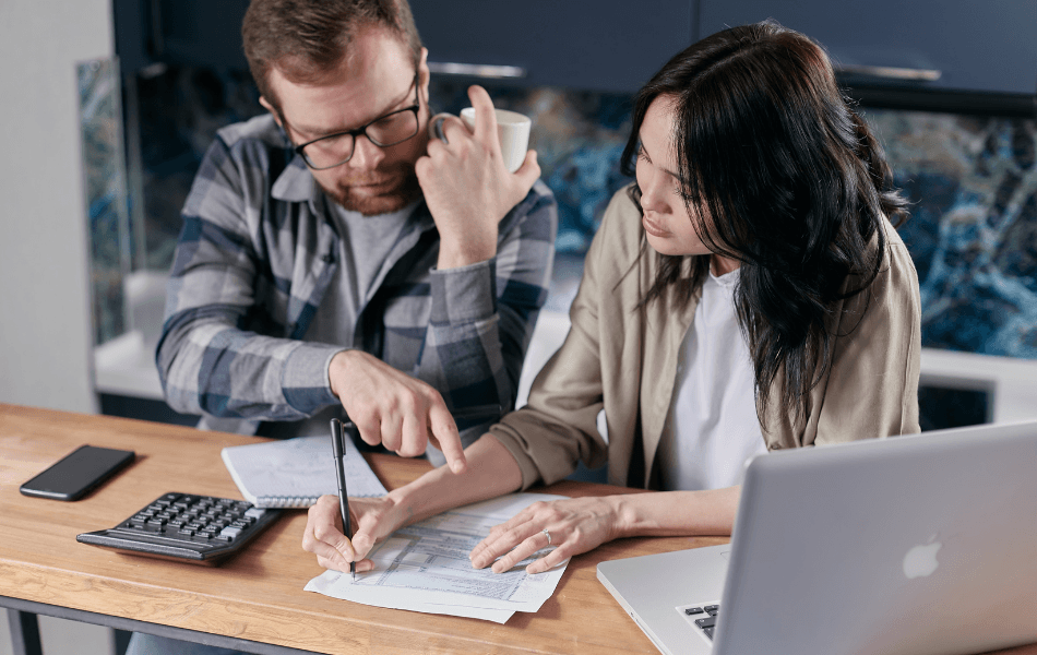 Couple looking at their expenses