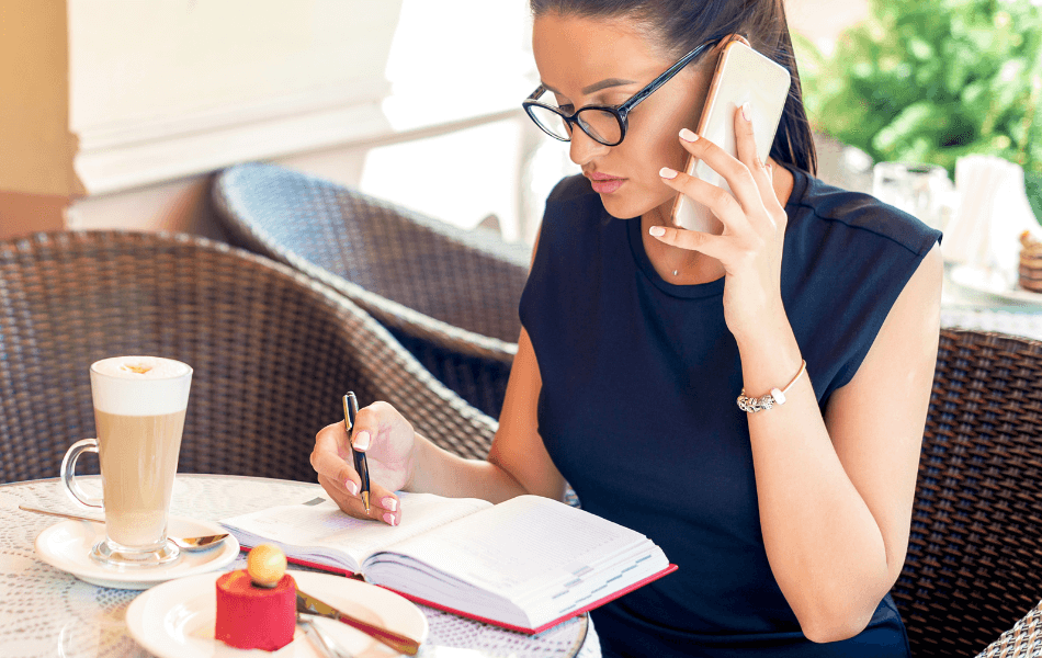 Person on business call in cafe