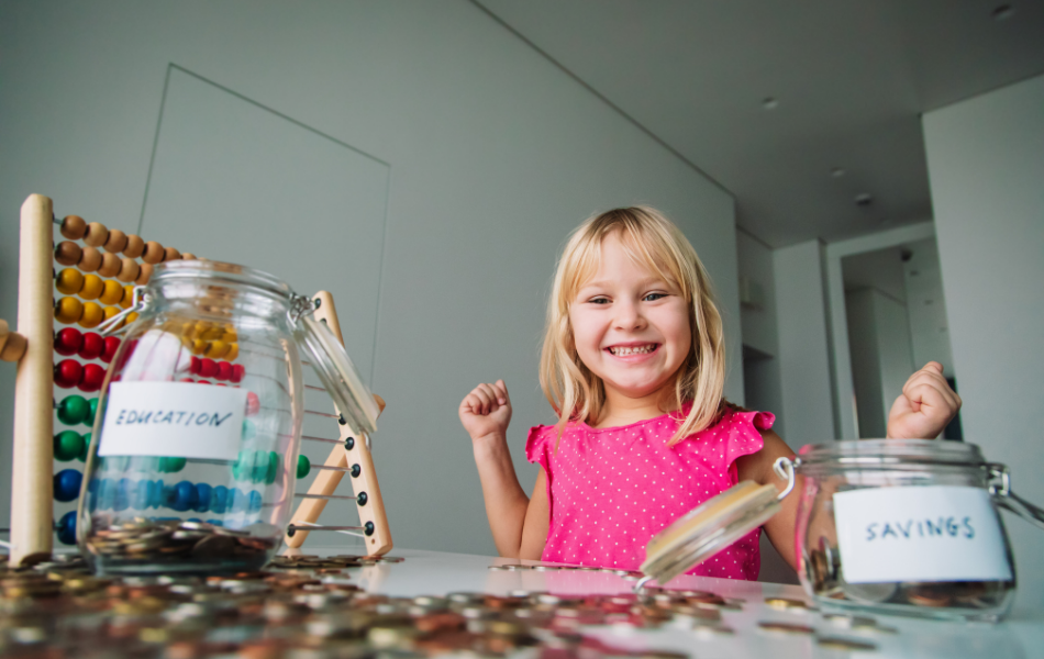 Kid saving coins in jars