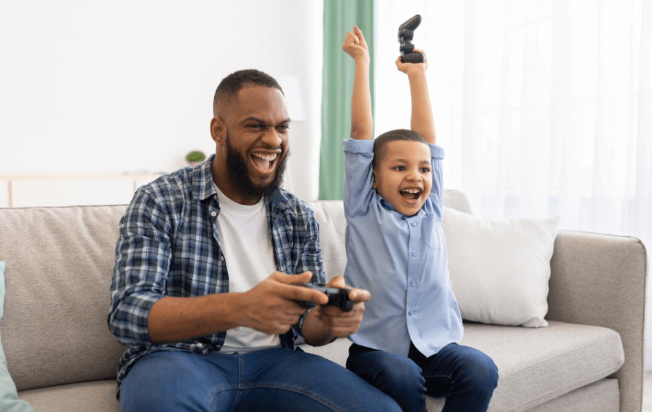 Father and son playing video games