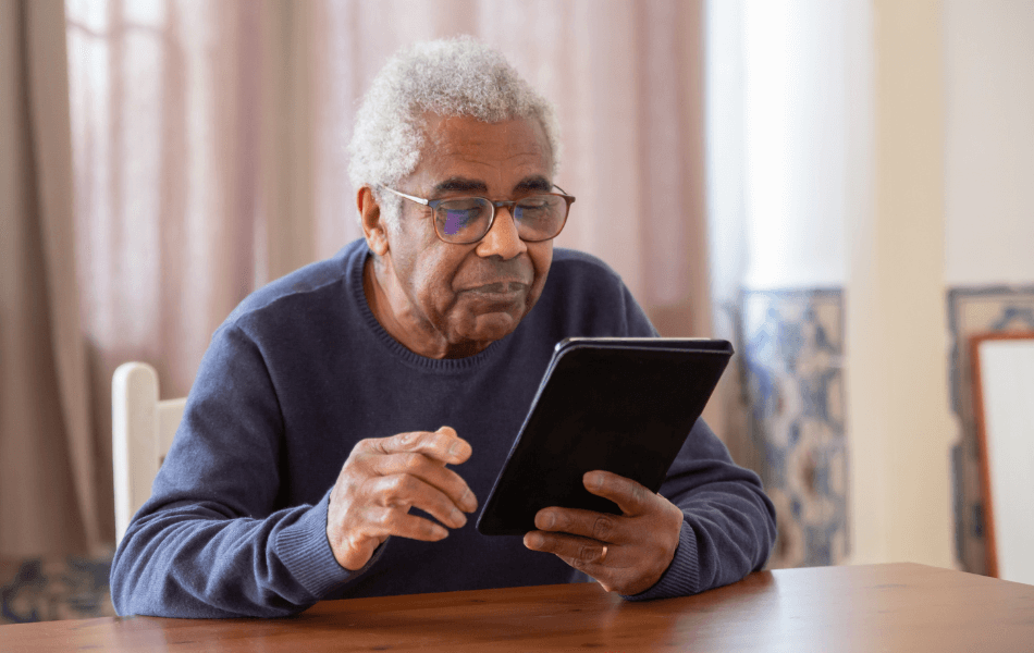 Senior on tablet