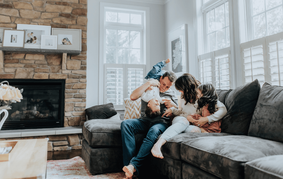 Family sitting on a couch