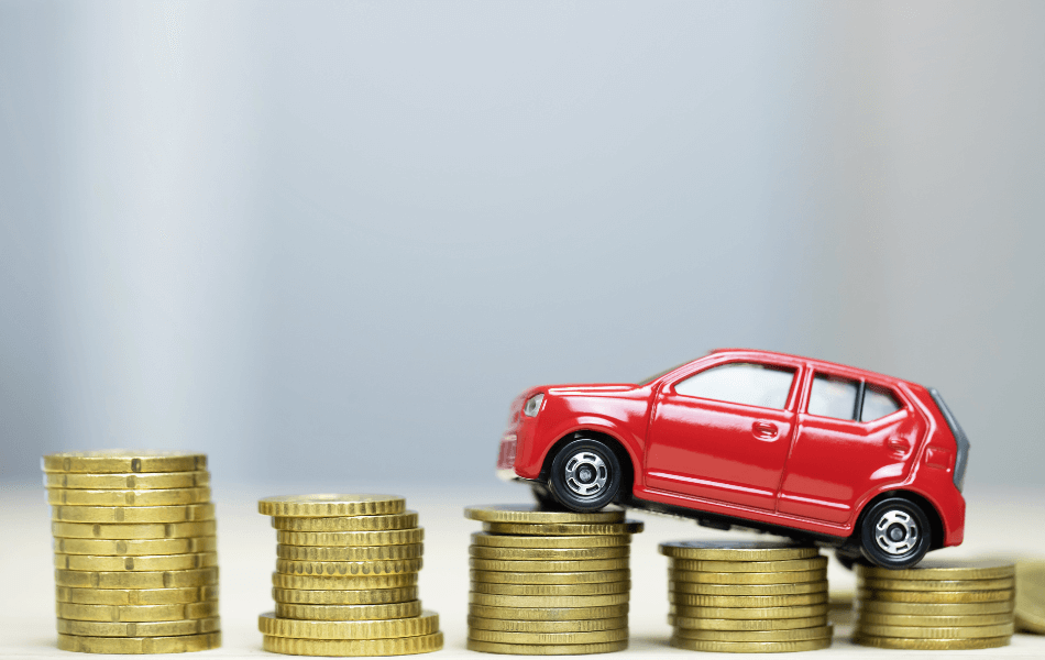 Toy car on top of coins