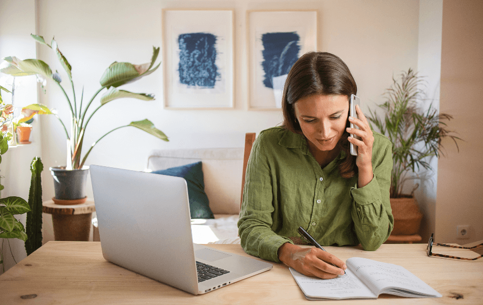 Person on their computer and cellphone