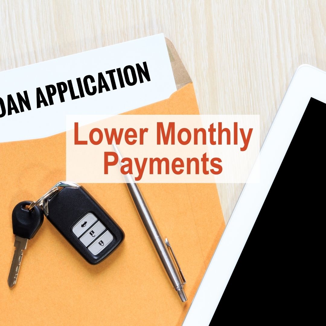 orange folder with loan application and car keys | Lower Monthly Payments