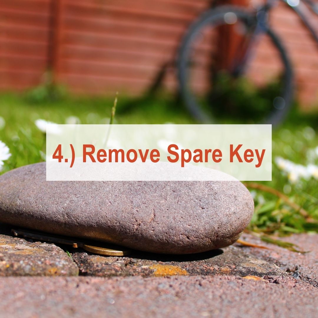 Rock in front yard with key underneath