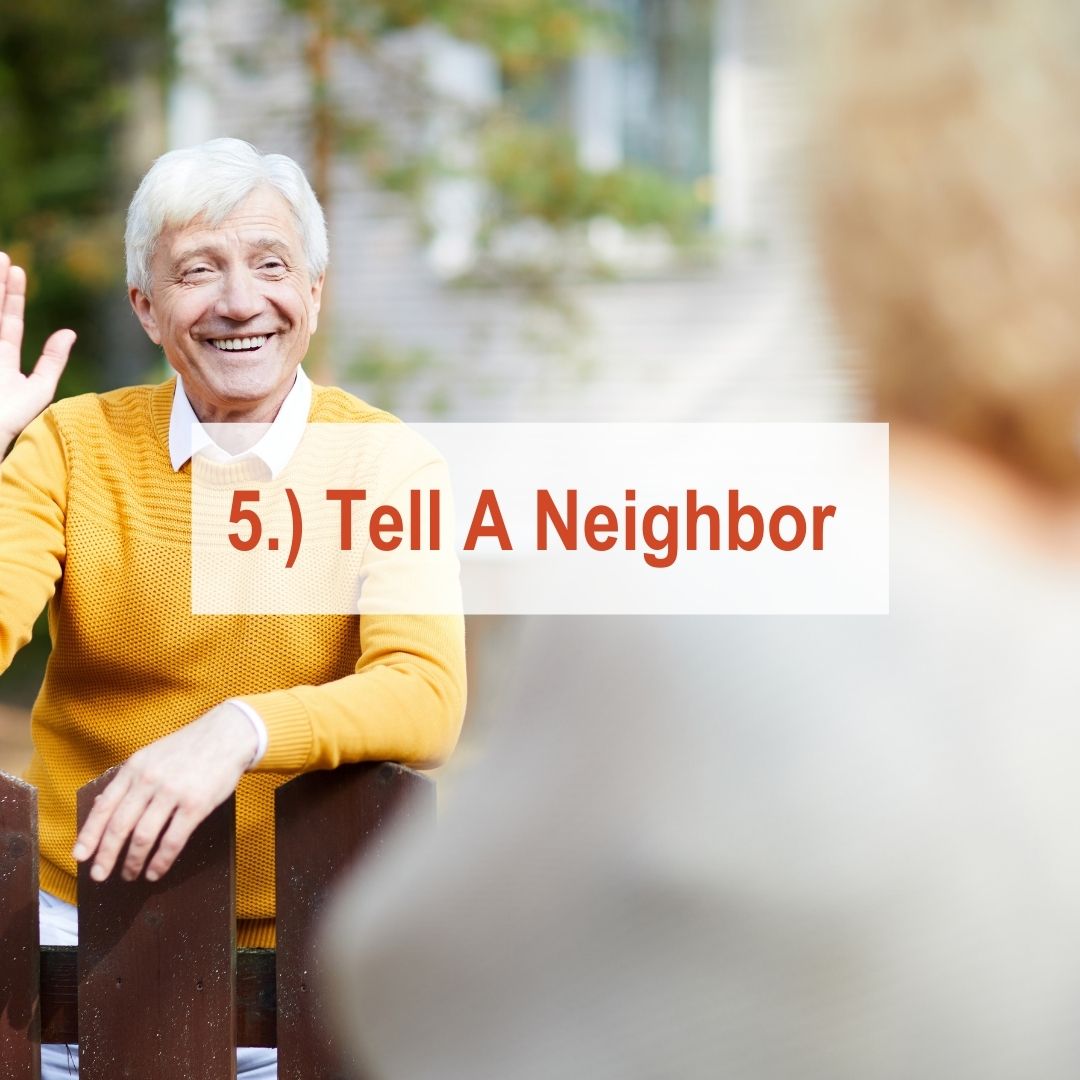 older man talking to older woman across fence | Tell a Neighbor