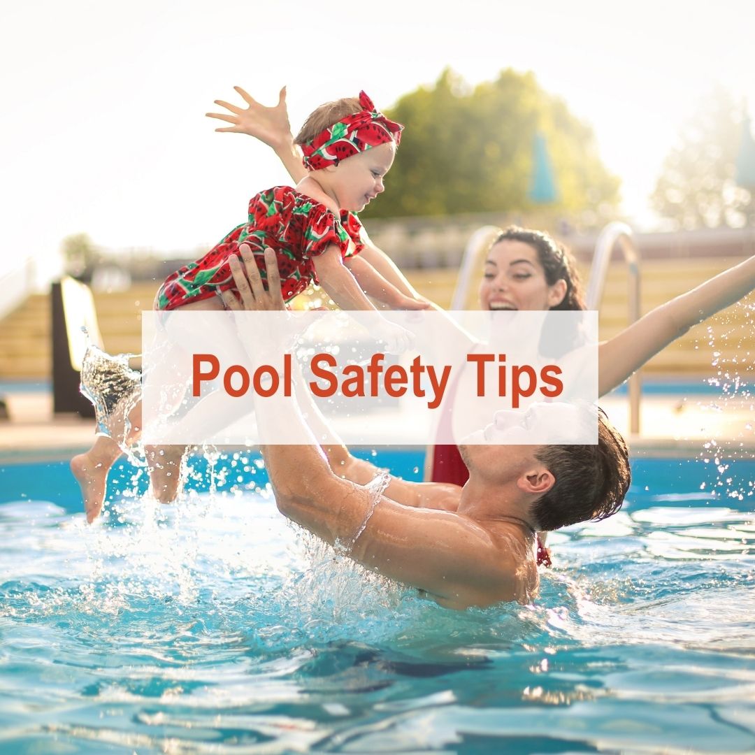 a dad holding up a baby up in the pool |Pool Safety Tips
